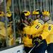 Michigan players Kevin Lynch, Zach Hyman, and Brennan Serville celebrate after a score in the third period on Friday. Daniel Brenner I AnnArbor.com